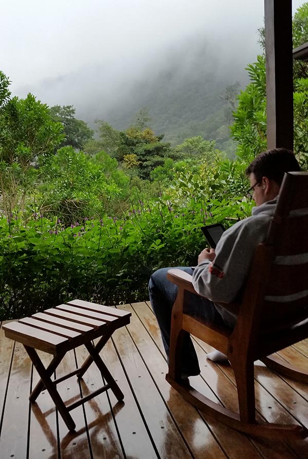 Reading on the porch at El Silencio